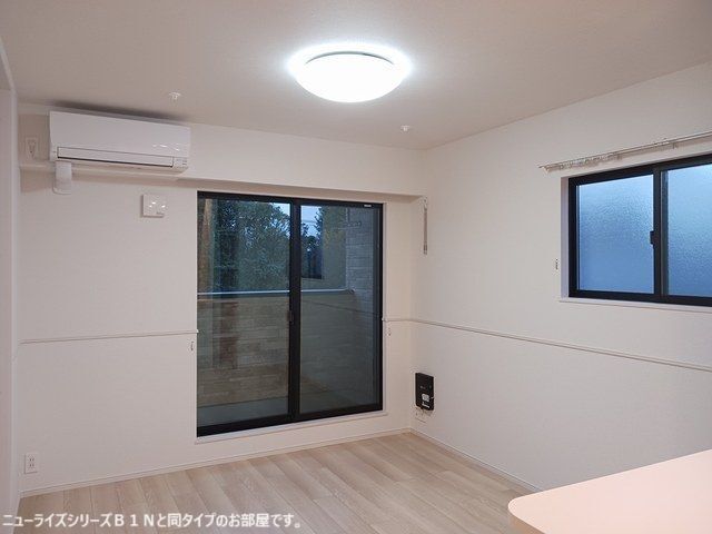 拡大写真:袋井市高尾 2階203の居間