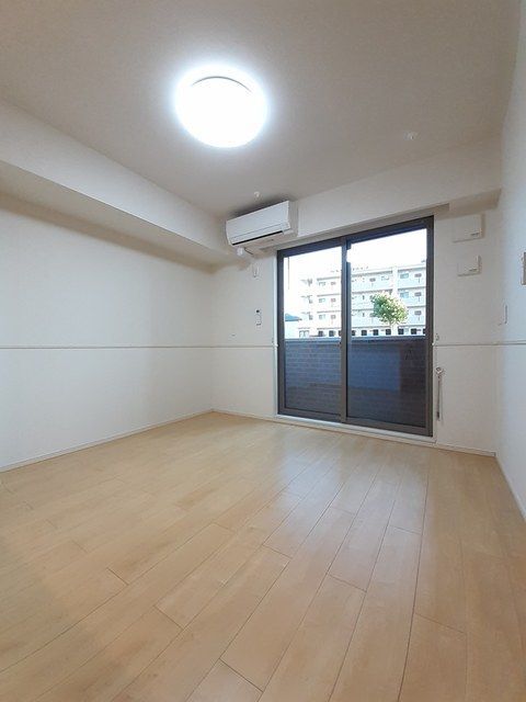 拡大写真:袋井市愛野南1丁目 1階102の居間