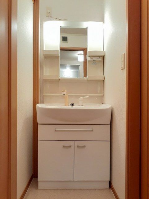 拡大写真:袋井市新堀 1階105の洗面所