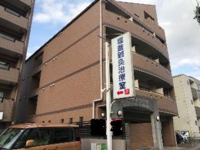 拡大写真：マンションリバーサイド 3階305の外観写真（昼）