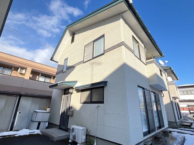 拡大写真：盛岡市永井１６地割 1階1の外観写真（昼）