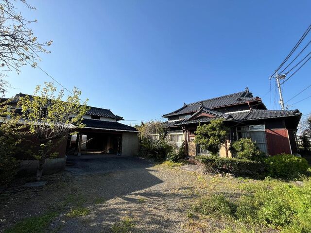 拡大写真:八分字町貸家 1階1の外観写真(昼)