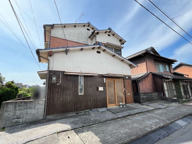 拡大写真:南稲堀戸建て2階 2階1の外観写真(昼)