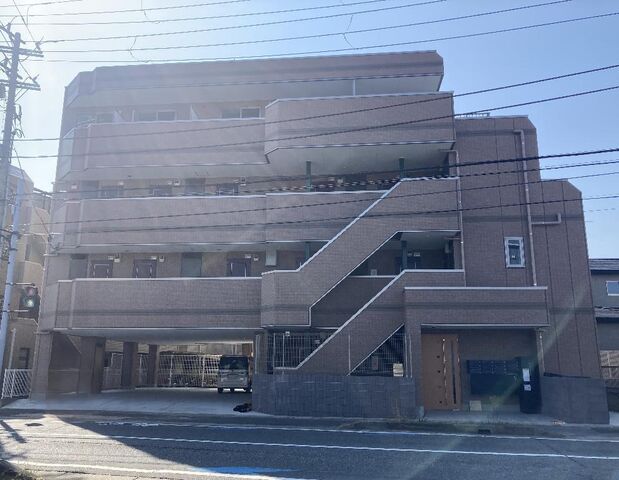 拡大写真：サンライズ幕張 3階304の外観写真（昼）