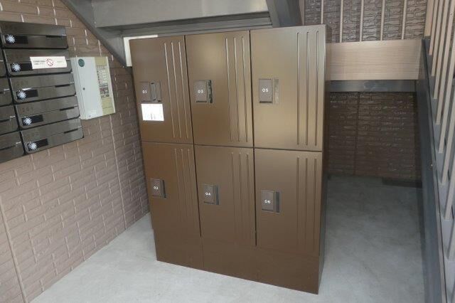 拡大写真：倉敷市水江 1階102の外観写真（昼）