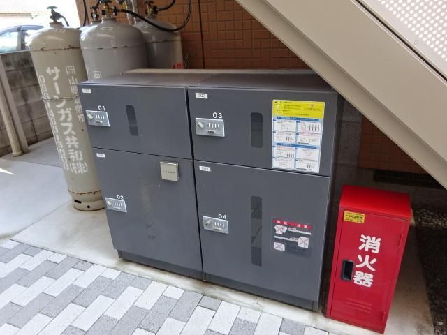 拡大写真:倉敷市美和1丁目 1階103の外観写真(昼)