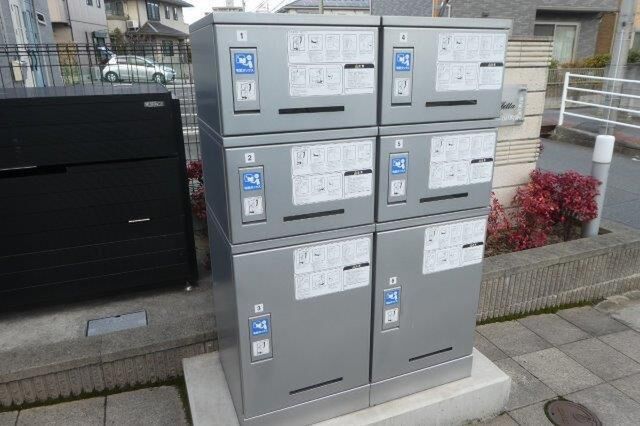 拡大写真:倉敷市西中新田 1階105の外観写真(昼)