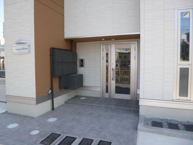 拡大写真:倉敷市阿知1丁目 1階102の外観写真(昼)