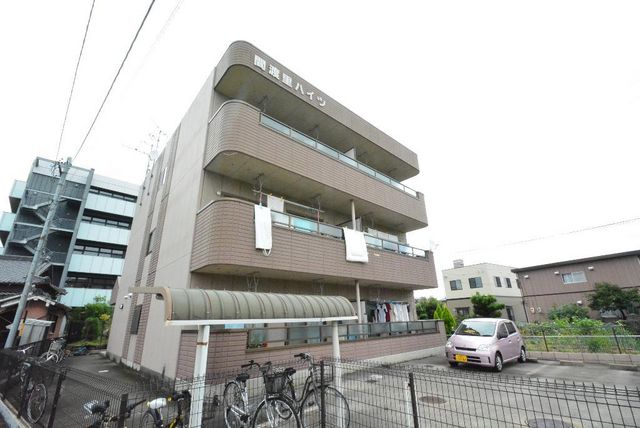 拡大写真:間渡里ハイツ 1階102の外観写真(昼)