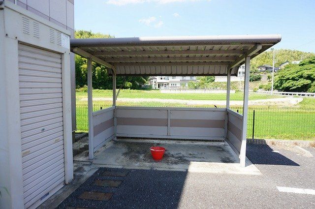 拡大写真:カーサハピネス 1階102の外観写真(昼)