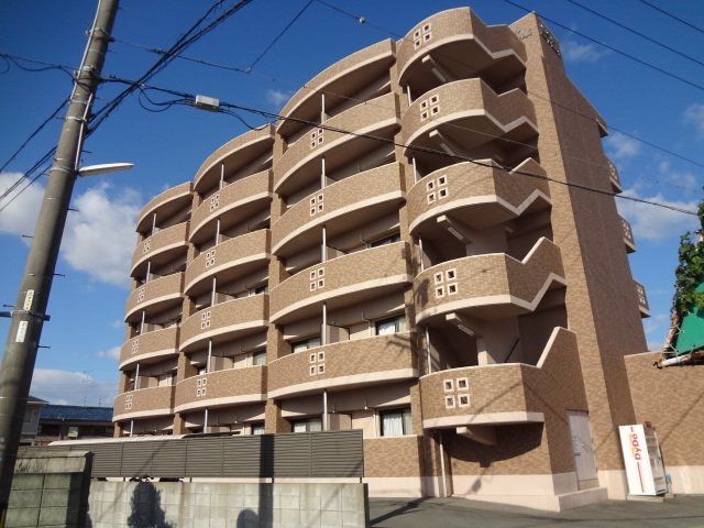 拡大写真：松阪市鎌田町 4階407の外観写真（昼）
