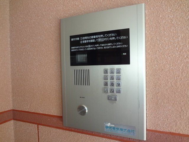 拡大写真：松阪市鎌田町 4階407の外観写真（昼）
