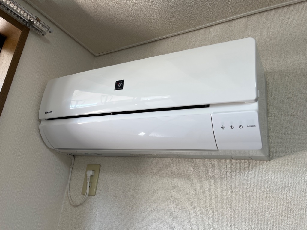 拡大写真:ファミリーメゾン新城 2階202のエアコン