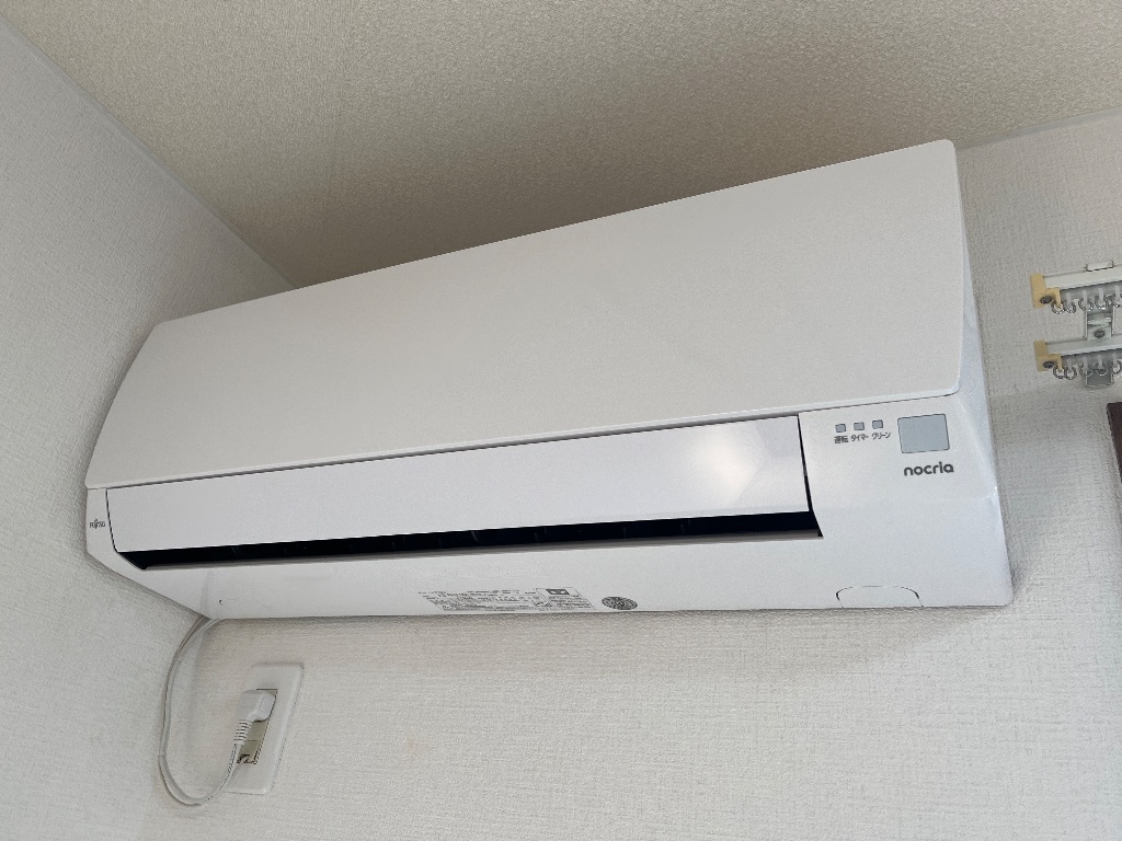 拡大写真:エスポア・タカスギ 1階105のエアコン