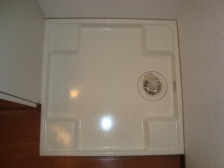 拡大写真:ポラリス 1階105の洗濯機置場