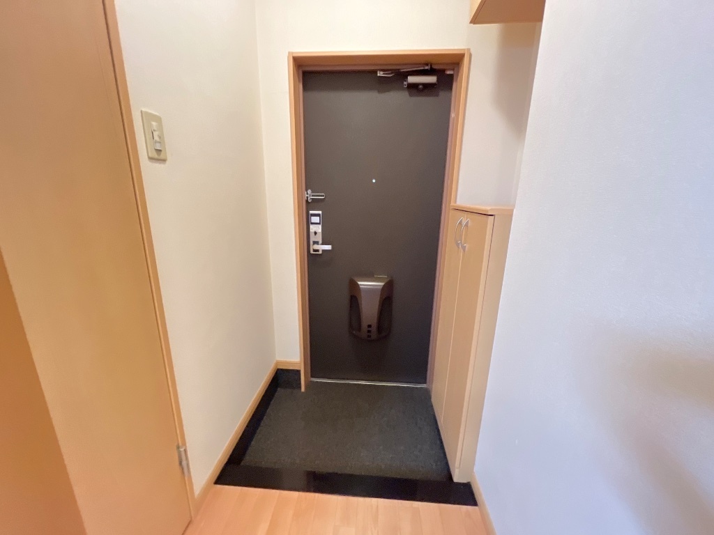 拡大写真：サンコート・コーダ 1階108の玄関