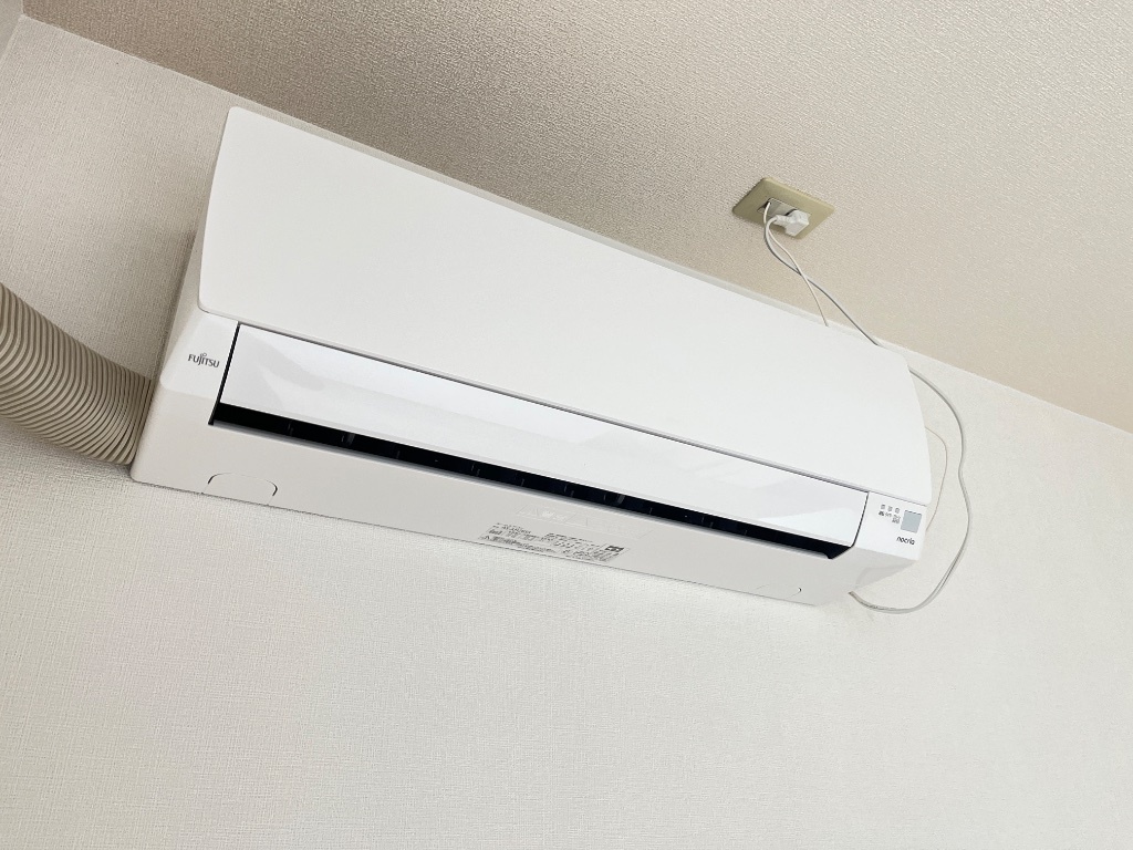 拡大写真：グランドコート　エスポア 2階205のエアコン