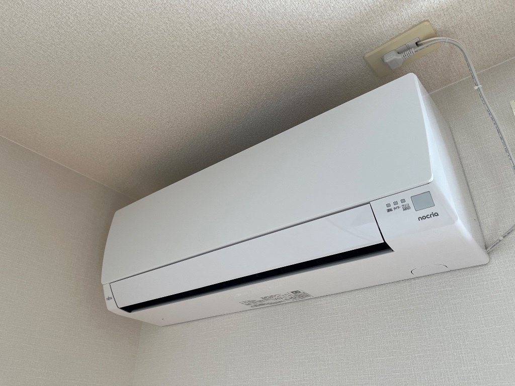 拡大写真:リビングストン 1階105のエアコン