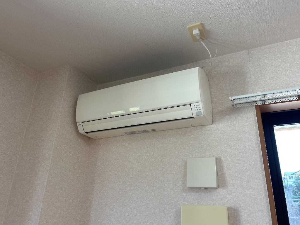 拡大写真:サンコート 2階201のエアコン