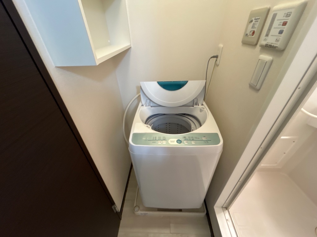 拡大写真:メゾンエスポワール希望 1階102の残置 洗濯機