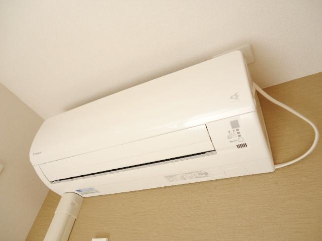 拡大写真:カネイコート日開野Ⅱ 1階101のエアコン