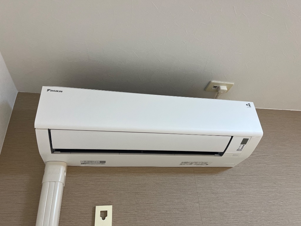 拡大写真:カネイコート日開野Ⅱ 1階103のエアコン(リビング)