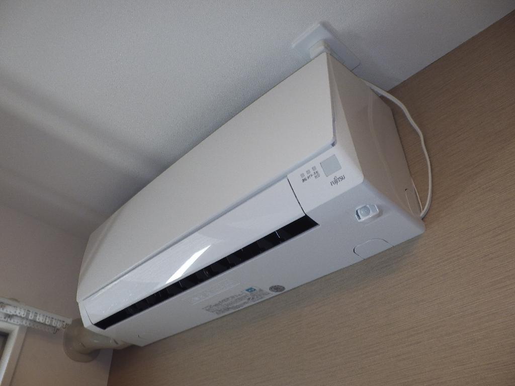拡大写真:パープルハイム 1階101のエアコン