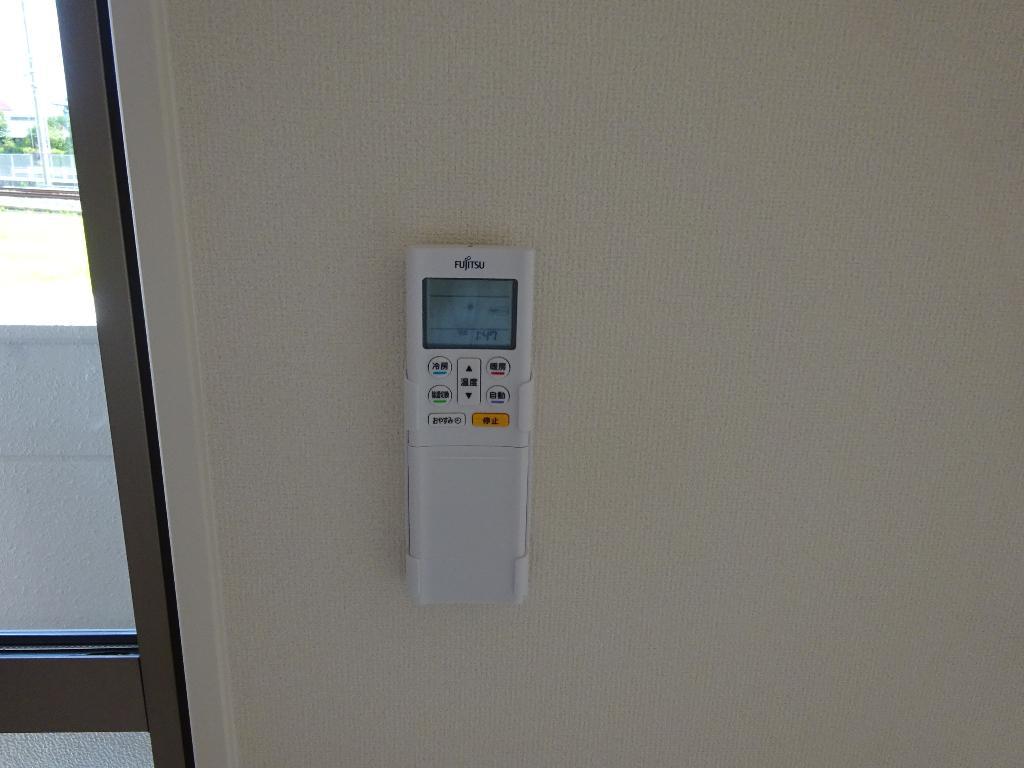 拡大写真:庵樹Ⅱ 1階102のエアコンリモコン