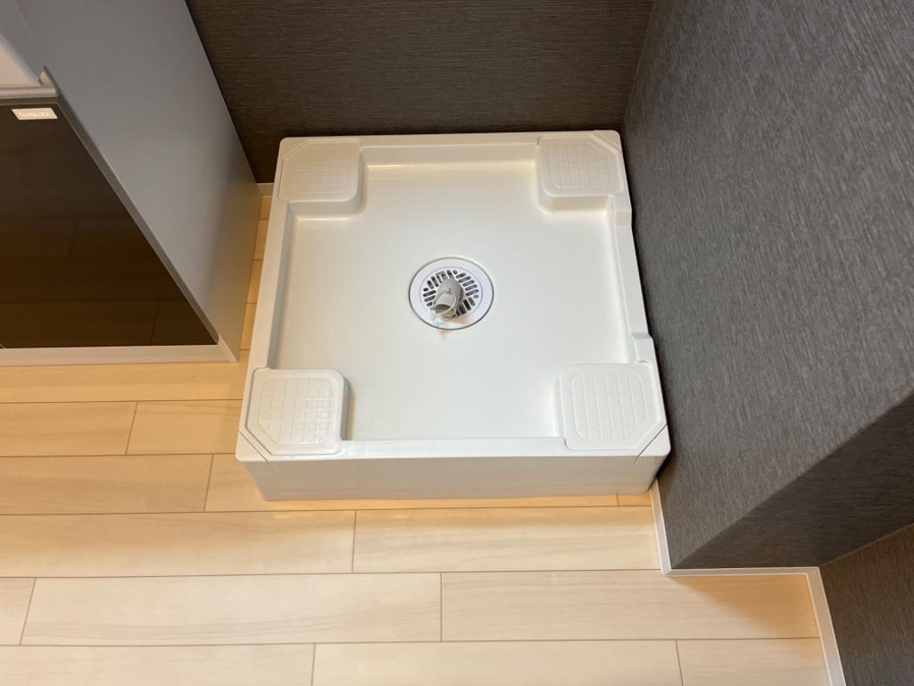 拡大写真：プリマベイス 2階202の洗濯機置場