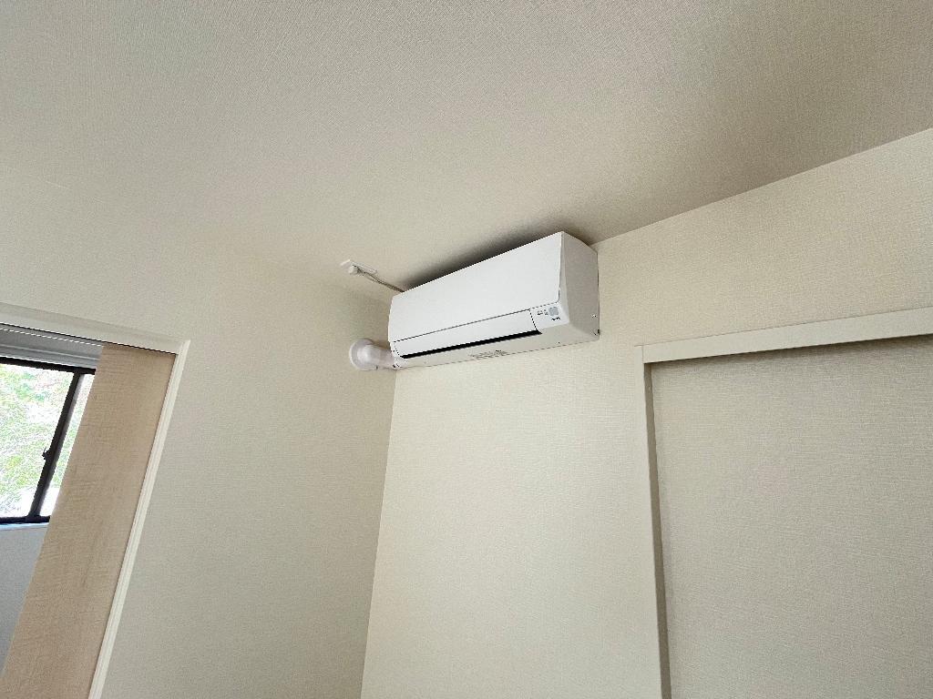 拡大写真:プランドール リサ 2階205のエアコン