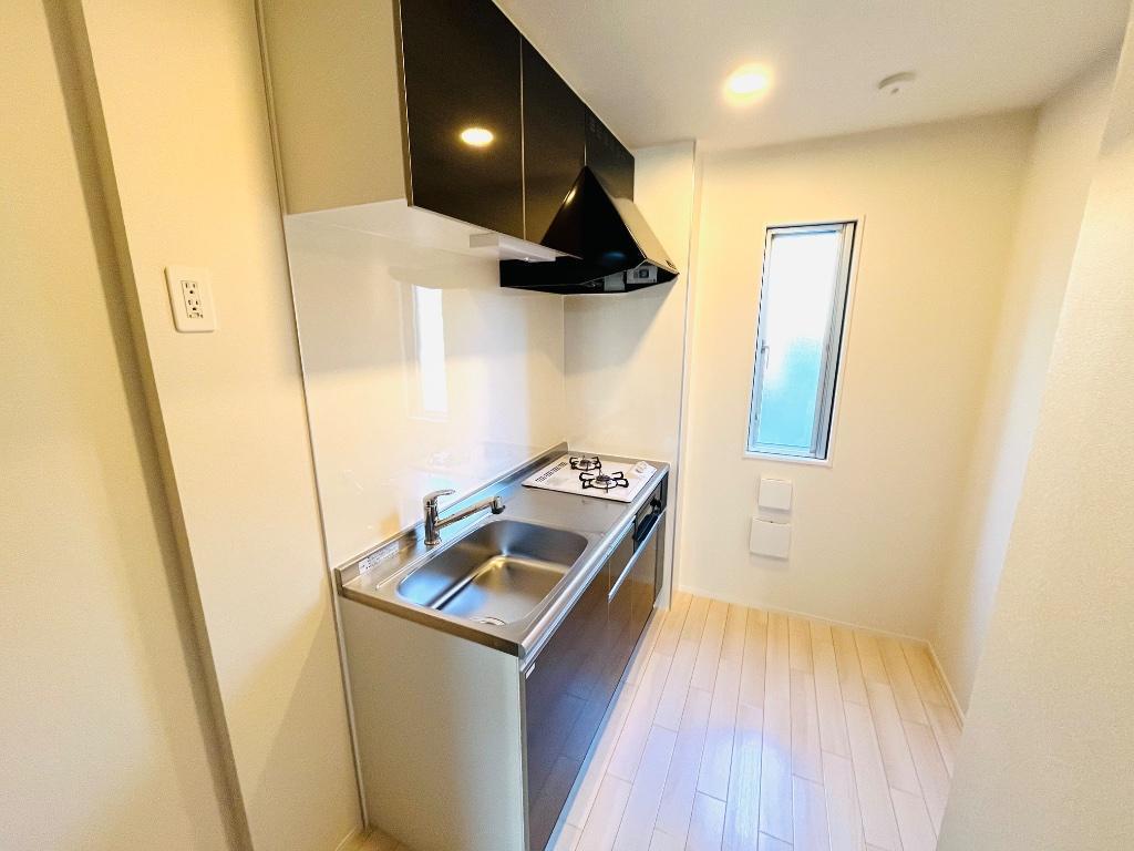 拡大写真：（仮）薬園町新築アパート 1階102のキッチン(イメージ)
