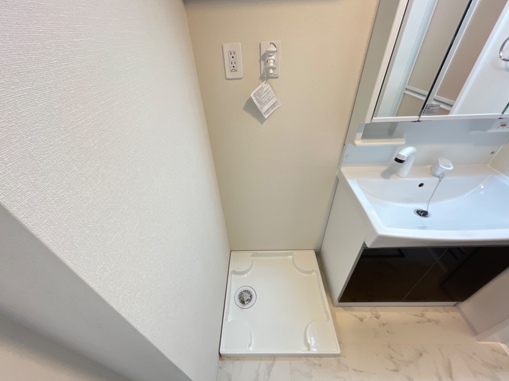 拡大写真:プリメゾン東郷 1階101の洗濯機置場(イメージ)