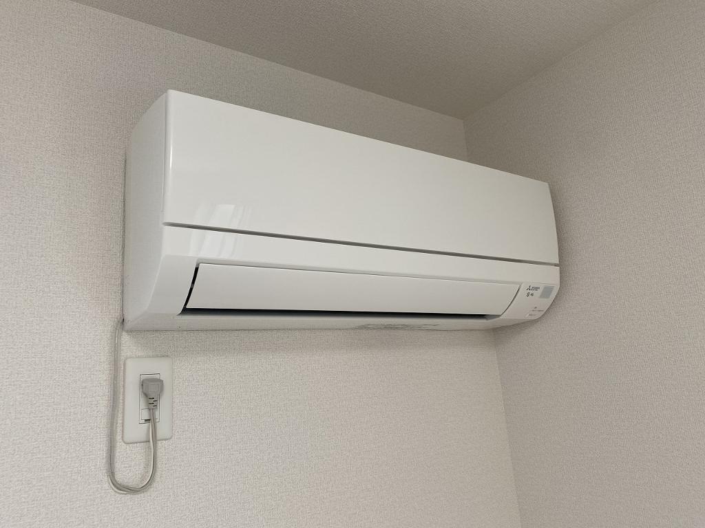 拡大写真:プレジール 1階101のエアコン
