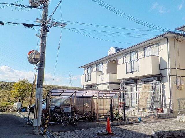 拡大写真：サンライフＡ棟 2階202の外観写真（昼）