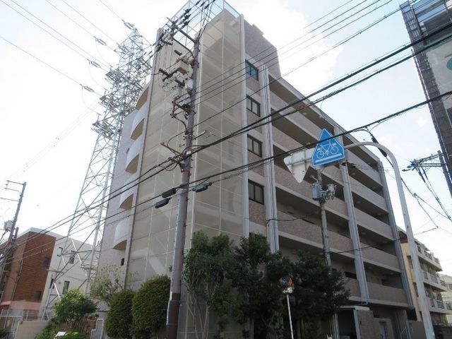 拡大写真：第３阿井マンション 4階403の外観写真（昼）
