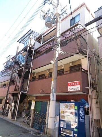 拡大写真：ネオハイツ 4階402の外観写真（昼）