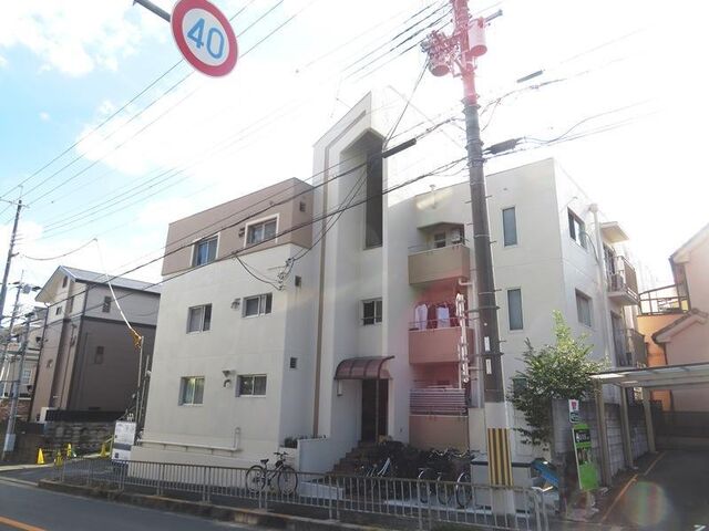 拡大写真：竹園コープ 1階103の外観写真（昼）