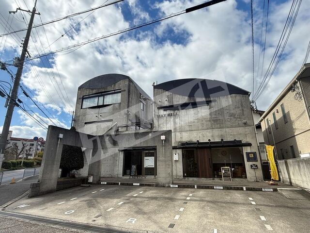 拡大写真：吹田市五月が丘北 2階202の外観写真（昼）