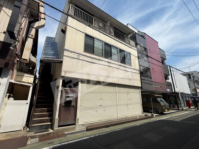 拡大写真：摂津市正雀本町１丁目 2階201の外観写真（昼）