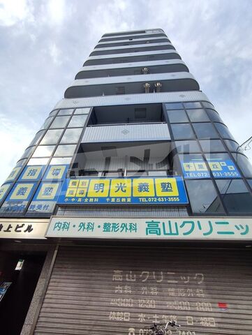 拡大写真:摂津市千里丘東1丁目 3階301の外観写真(昼)