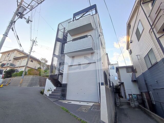 拡大写真:吹田市千里山西1丁目 1階101の外観写真(昼)
