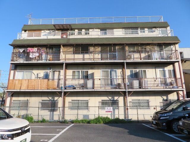 拡大写真：吹田市南清和園町 4階402の外観写真（昼）