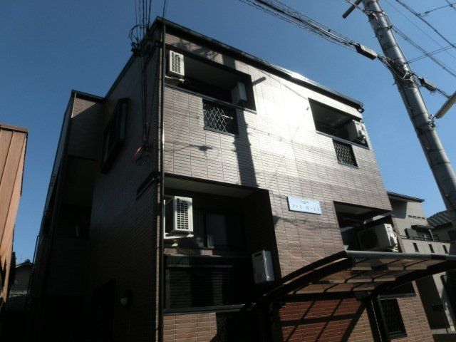 拡大写真：ファミール・エス 2階202の外観写真（昼）