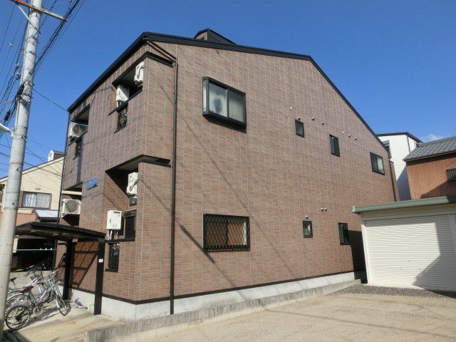 拡大写真：ファミール・エス 2階202の外観写真（昼）