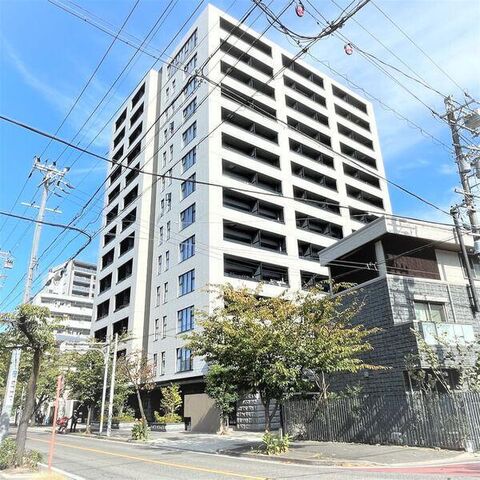 拡大写真：GRAND ESPOIR IZUMI 8階802の外観写真（昼）