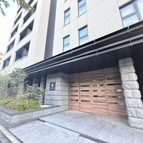 拡大写真：GRAND ESPOIR IZUMI 8階802の外観写真（昼）