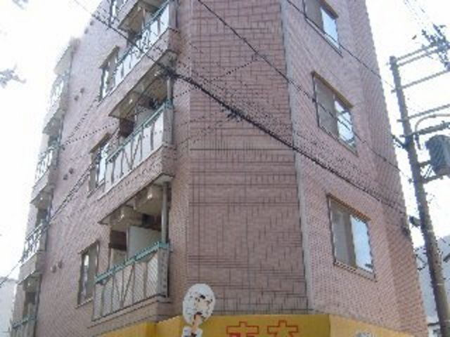 拡大写真：ミレニアム門真 2階201の外観写真（昼）