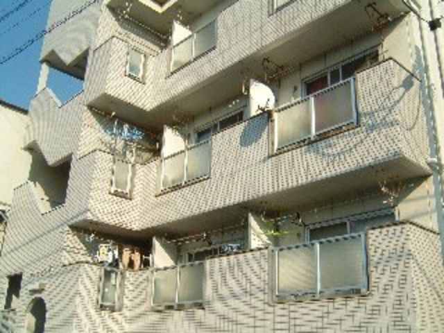 拡大写真：マンション寿 3階301の外観写真（昼）