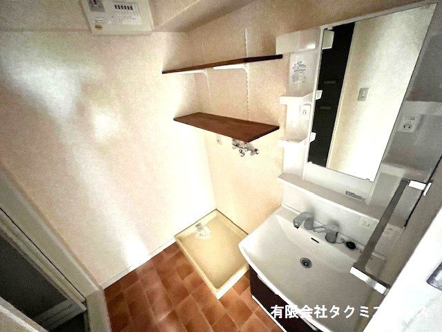 拡大写真:サンパーク鈴蘭 1階101の洗濯機置場