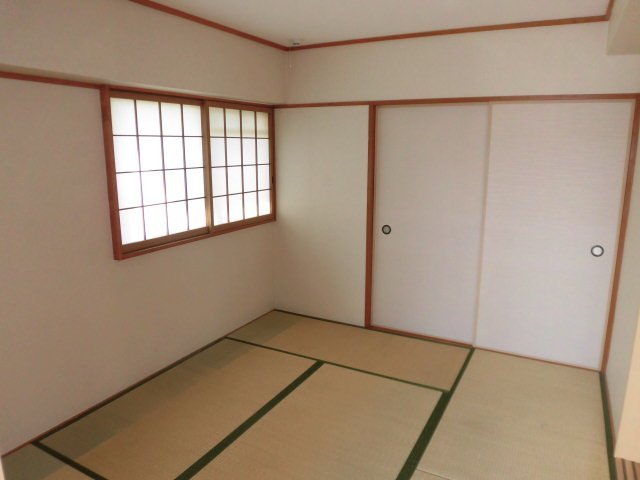 拡大写真：コアロード桃山台 5階506の寝室